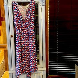 Donna Morgan size 12 petite mid length dress. Multicolored. Faux wrap dress.